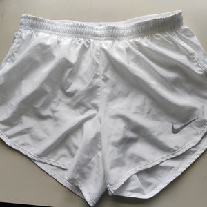white Nike running shorts